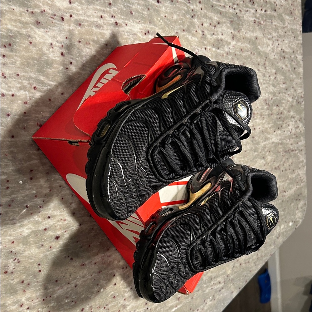 Nike Black and Metallic Sneakers